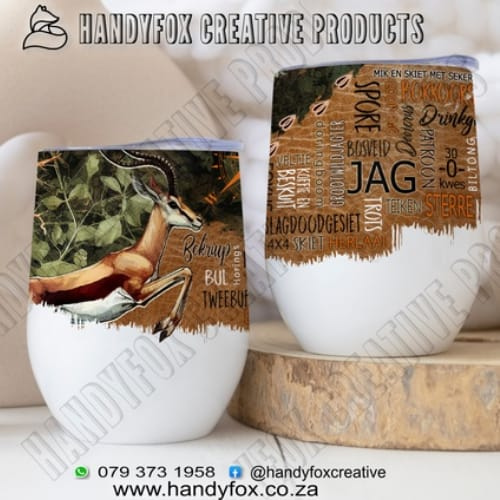 Two white ceramic mugs feature animal and typographic art, placed on a wooden surface with a HandyFox watermark in the background.