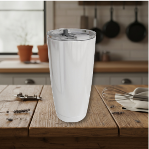 White blender bottle on a wooden kitchen island, with a lid and a blurred countertop background